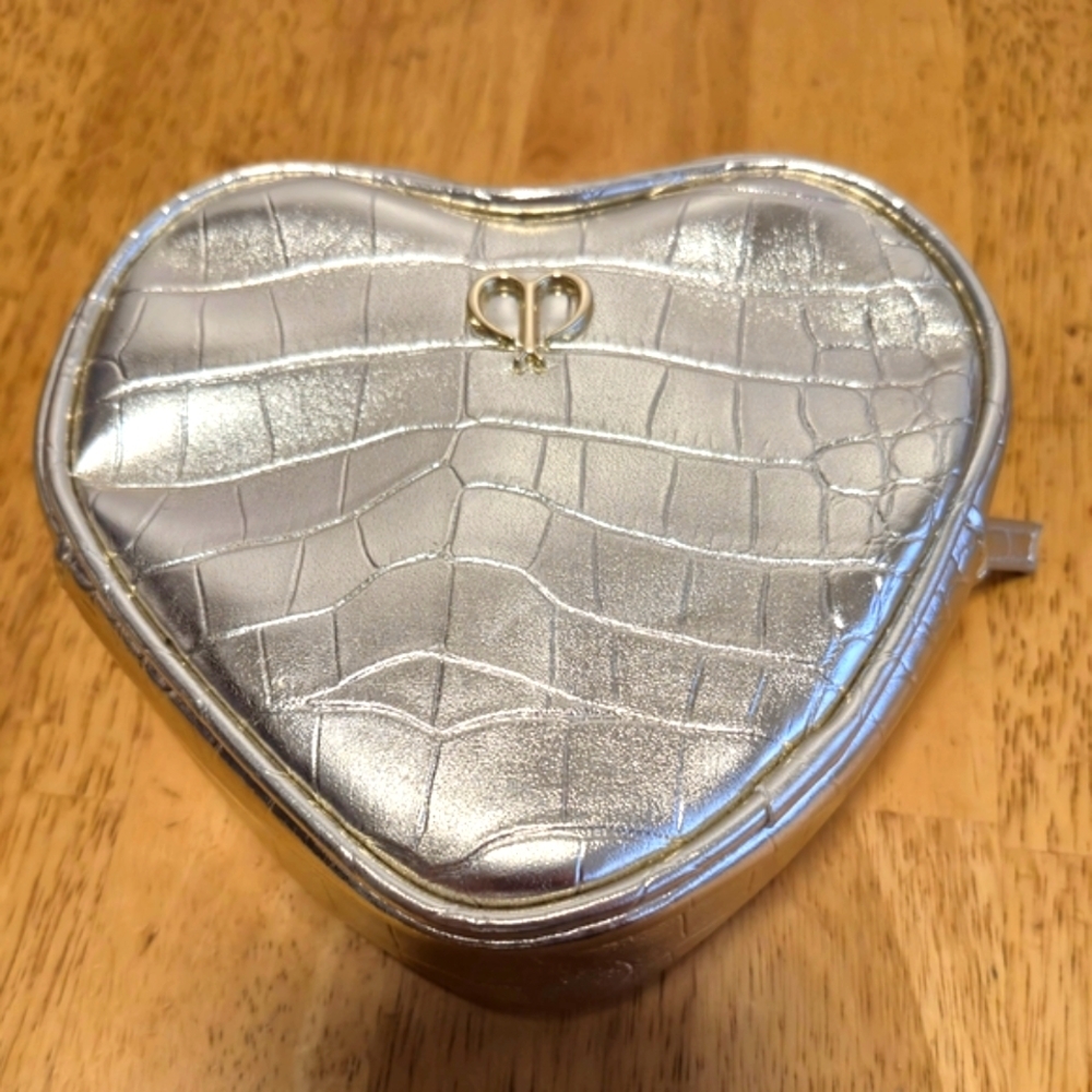 Cle de Peau golden Quilted Cosmetic Bag